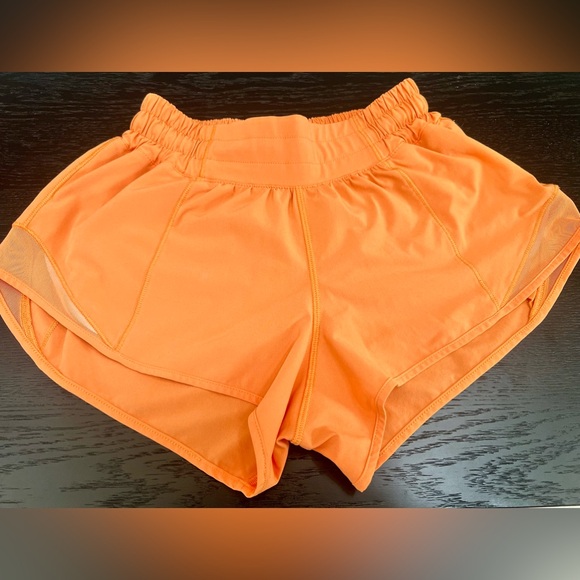 Lululemon Hotty Hot Low Rise
2.5 inch 
Color  Orange Soda 
Size 2 - Picture 1 of 4